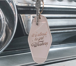 "It's about to get Western" Vintage Hotel Keychain